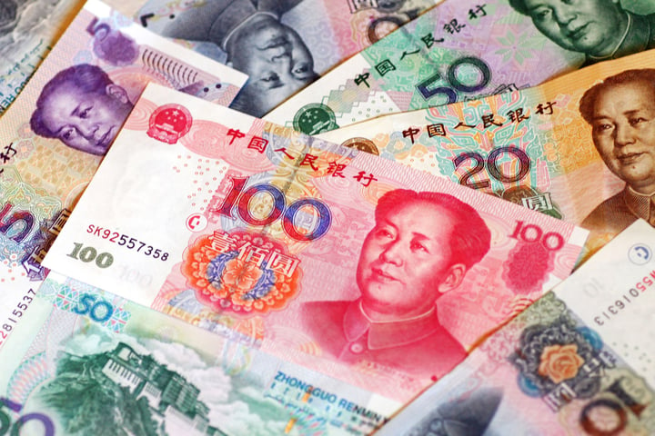 Yuan higher as GDP data shows growth uptick